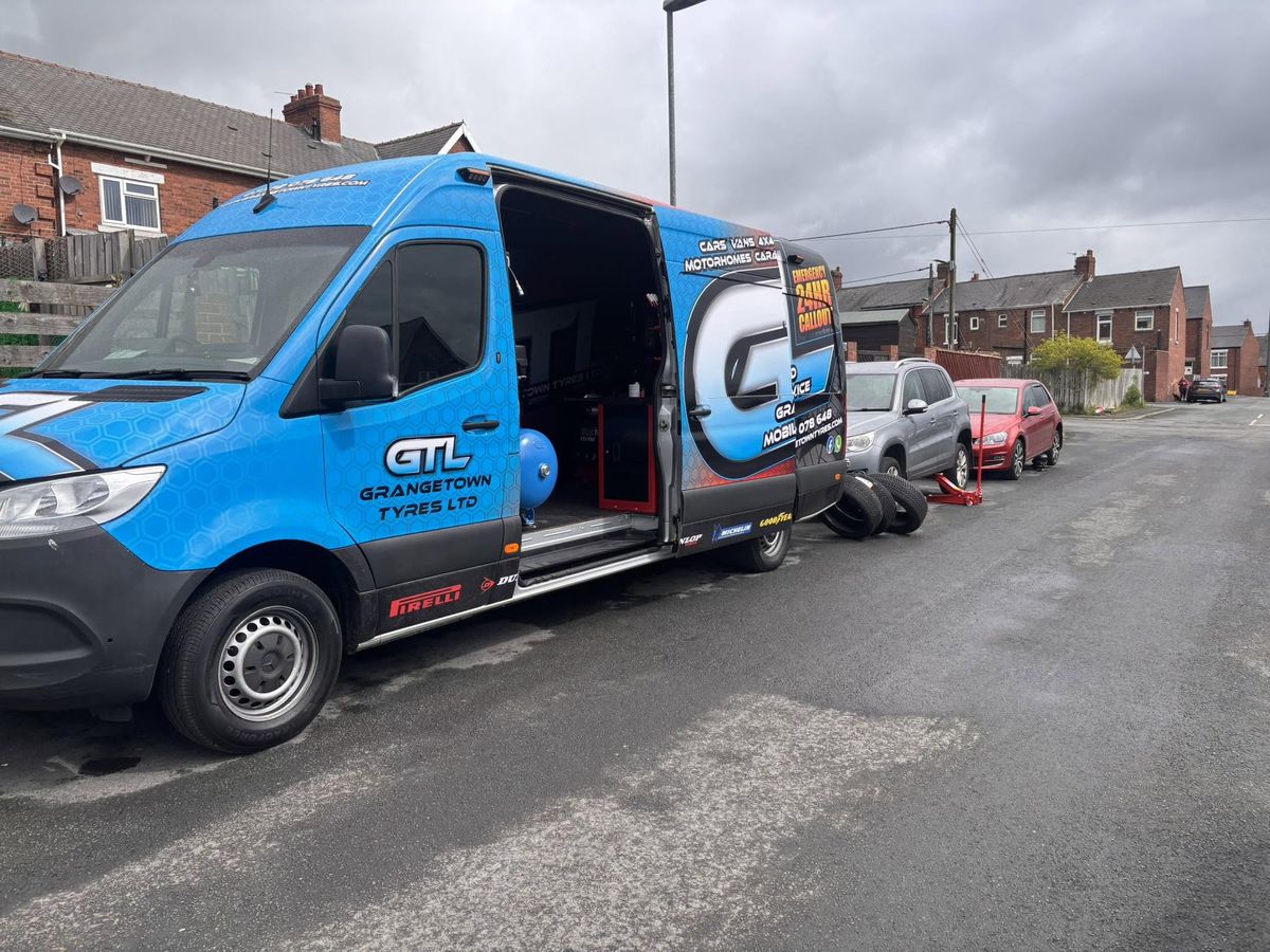 Grangetown Tyres balancing a wheel at a customer's home