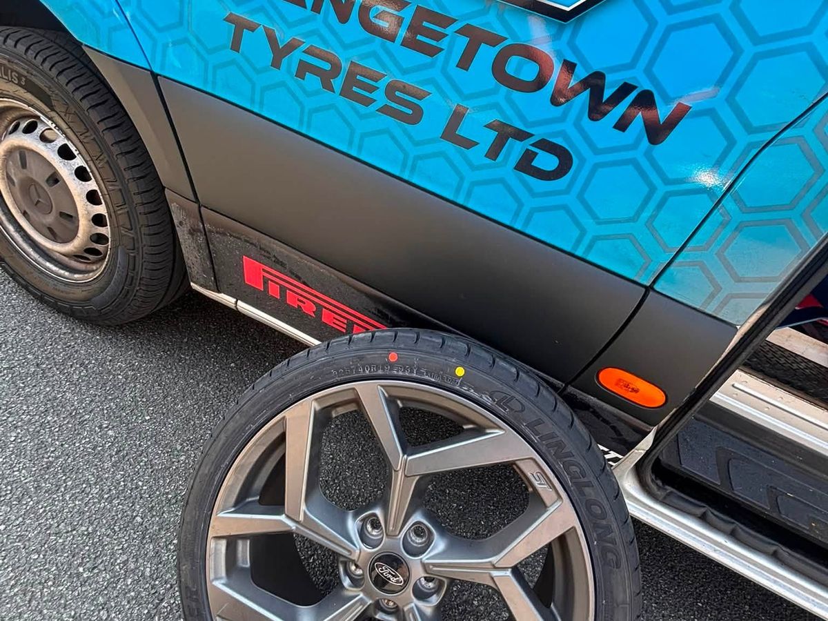 van fitting tyres in an east Durham village